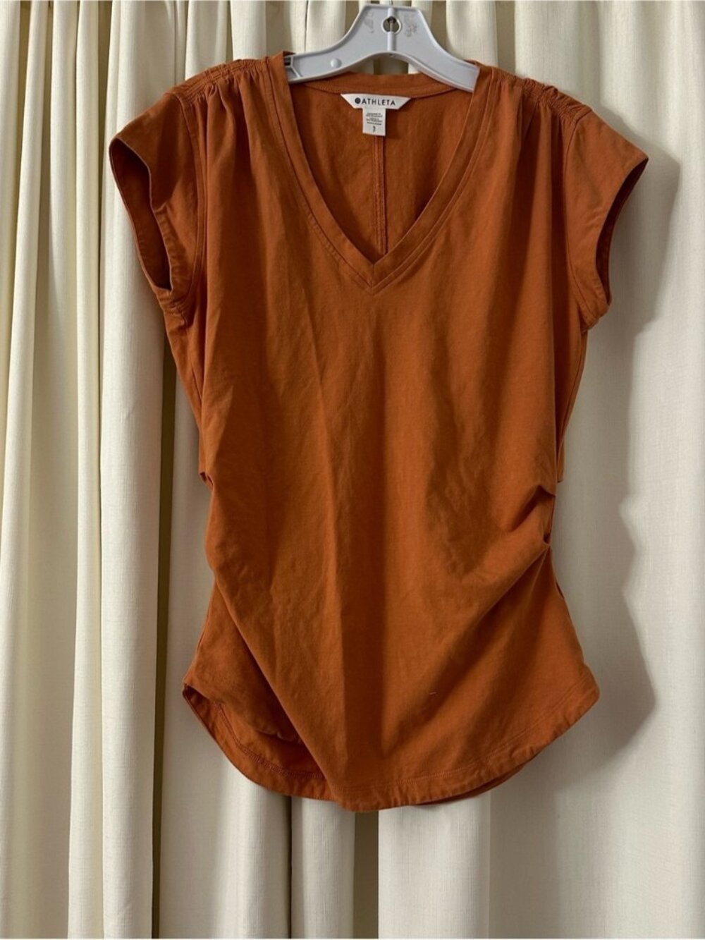 Orange short-sleeved top
